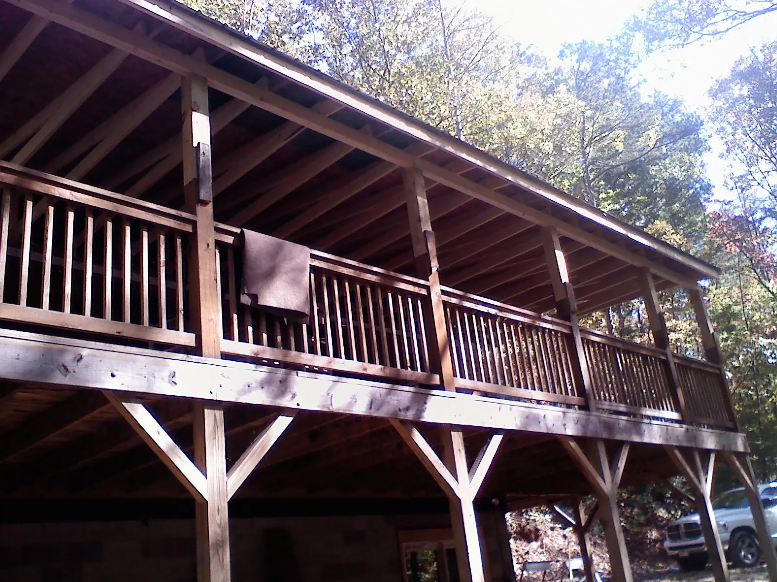 Timber framing under a new elevated porch and deck — Roof Leak Repair in Leland by Roofing Brothers